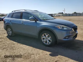 2015 Mazda CX-9 Touring with VIN JM3TB2CV1F0469009, listed as a Copart auction lot 59225785 with 93,330 mi miles and Salvage title. Bid and sale history available at DreamBid. Image 4.