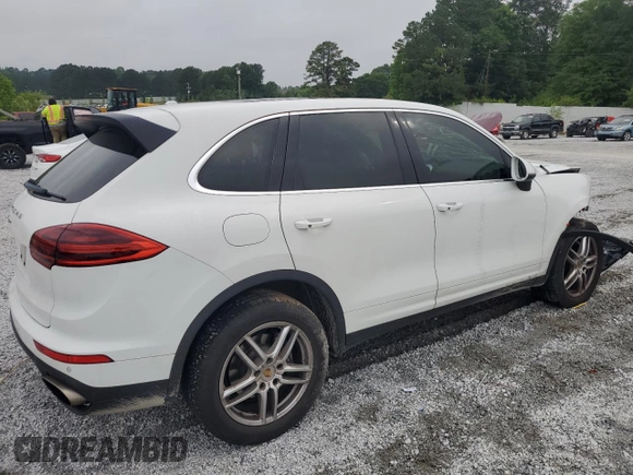 2016 Porsche Cayenne z VIN WP1AA2A25GLA10575, wystawiony jako Copart lot #56941595 z przebiegiem Nie podano mil oraz Szkoda całkowita • Salvage title. Historia ofert i sprzedaży dostępna na DreamBid. Obrazek 3.