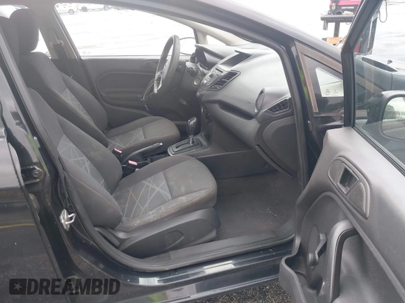 2014 Ford Fiesta S z VIN 3FADP4AJ9EM104704, wystawiony jako IAAI lot #42016647 z przebiegiem 81 826 mil mil oraz . Historia ofert i sprzedaży dostępna na DreamBid. Obrazek 5.