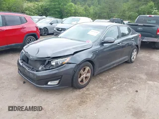 2015 Kia Optima LX with VIN KNAGM4A75F5626707, listed as a IAAI auction lot 42148396 with 84,189 mi miles and . Bid and sale history available at DreamBid. Image 2.
