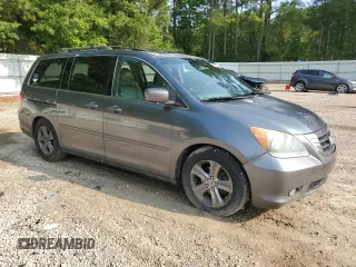 2010 Honda Odyssey Touring z VIN 5FNRL3H93AB087771, wystawiony jako Copart lot #59322835 z przebiegiem 247 000 mil mil oraz Czysty tytuł • Clean title. Historia ofert i sprzedaży dostępna na DreamBid. Obrazek 4.