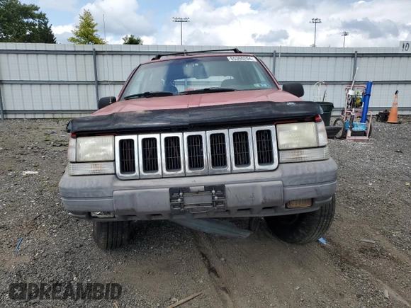 1997 Jeep Grand Cherokee Laredo with VIN 1J4GZ58S8VC601342, listed as a Copart auction lot 65360204 with 139,036 mi miles and Salvage Title. Bid and sale history available at carsss.com. Image 5.