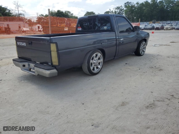 1996 Nissan Trucks 2WD XE with VIN 1N6SD11S0TC311270, listed as a Copart auction lot 53870965 with 145,595 mi miles and Salvage Title. Bid and sale history available at carsss.com. Image 3.