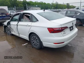 2021 Volkswagen Jetta S z VIN 3VWC57BU9MM103778, wystawiony jako IAAI lot #42493041 z przebiegiem 74 723 mil mil oraz . Historia ofert i sprzedaży dostępna na DreamBid. Obrazek 3.