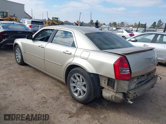 2006 Chrysler 300 C with VIN 2C3KA63HX6H487887, listed as a IAAI auction lot 41603068 with 133,169 mi miles. Bid and sale history available at carsss.com. Image 3.