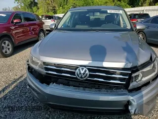 2021 Volkswagen Tiguan S with VIN 3VV1B7AX9MM023655, listed as a Copart auction lot 64159445 with 55,795 mi miles and Salvage title. Bid and sale history available at DreamBid. Image 13.