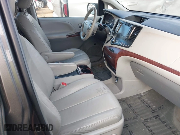 2013 Toyota Sienna XLE with VIN 5TDDK3DC6DS054942, listed as a IAAI auction lot 41172005 with 202,675 mi miles and . Bid and sale history available at DreamBid. Image 5.