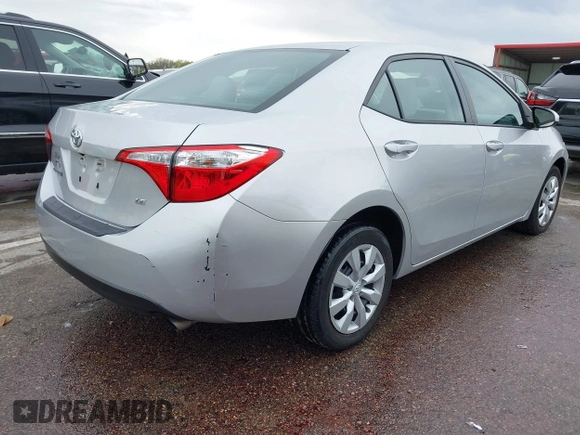 2016 Toyota Corolla L with VIN 5YFBURHE3GP484487, listed as a IAAI auction lot 41953619 with 50,784 mi miles and . Bid and sale history available at DreamBid. Image 4.