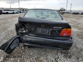 1998 BMW 5 Series 528iA with VIN WBADD6320WGT90679, listed as a Copart auction lot 86262224 with 200,336 mi miles and Salvage Title. Bid and sale history available at carsss.com. Image 6.