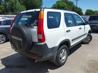 2003 Honda CR-V LX z VIN JHLRD68403C017375, wystawiony jako IAAI lot #42237124 z przebiegiem 172 054 mil mil oraz . Historia ofert i sprzedaży dostępna na DreamBid. Obrazek 4.