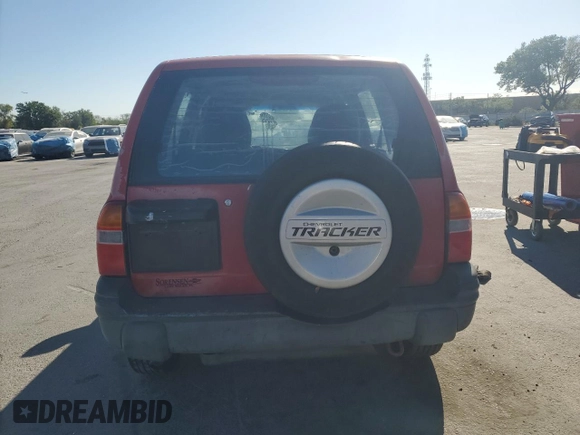 2000 Chevrolet Tracker z VIN 2CNBE13C8Y6937070, wystawiony jako Copart lot #49315885 z przebiegiem 340 051 mil mil oraz Szkoda całkowita • Salvage title. Historia ofert i sprzedaży dostępna na DreamBid. Obrazek 6.