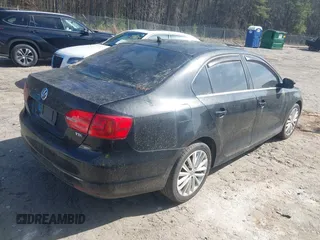 2013 Volkswagen Jetta TDI w/Premium/Nav with VIN 3VWLL7AJ8DM285616, listed as a IAAI auction lot 41597180 with 197,150 mi miles and . Bid and sale history available at DreamBid. Image 4.