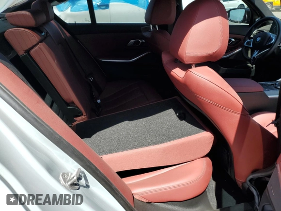 2023 BMW 3 Series 330i with VIN 3MW69FF00P8D52700, listed as a Copart auction lot 61629485 with 12,007 mi miles and Salvage title. Bid and sale history available at DreamBid. Image 10.