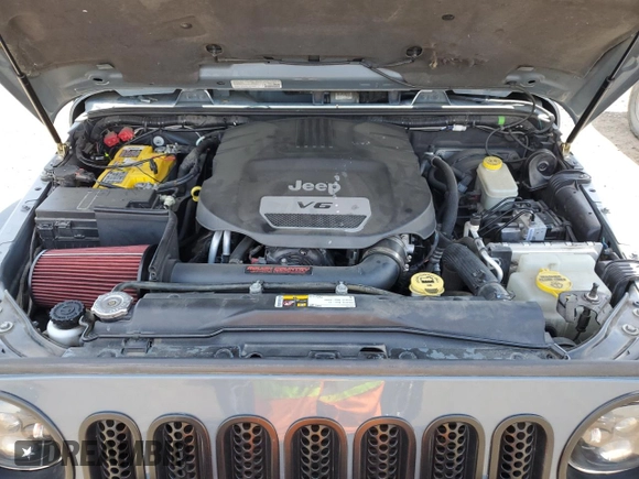 2014 Jeep Wrangler Unlimited Sahara with VIN 1C4BJWEG7EL228307, listed as a Copart auction lot 58663455 with 188,024 mi miles and Salvage title. Bid and sale history available at DreamBid. Image 12.