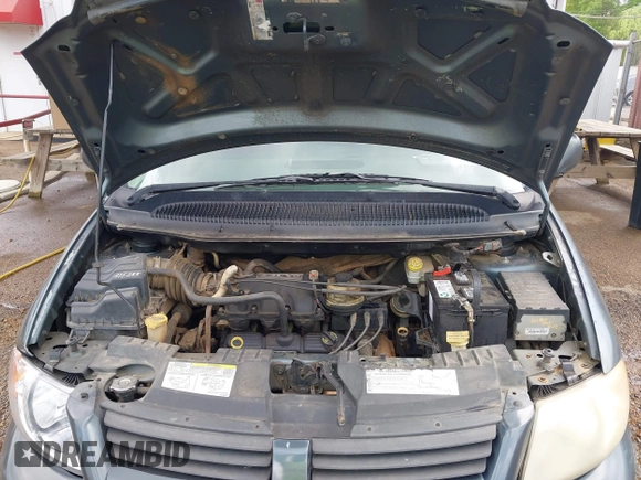2006 Dodge Grand Caravan SE with VIN 1D4GP24R36B605743, listed as a IAAI auction lot 42068947 with 324,595 mi miles and . Bid and sale history available at DreamBid. Image 10.