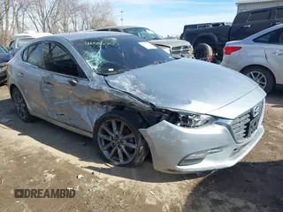 2018 Mazda 3 Touring z VIN 3MZBN1V36JM205904, wystawiony jako IAAI lot #41586707 z przebiegiem 145 401 mil mil oraz . Historia ofert i sprzedaży dostępna na DreamBid. Obrazek 1.