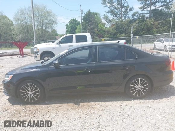 2016 Volkswagen Jetta Sport z VIN 3VWD17AJ9GM259251, wystawiony jako IAAI lot #42061241 z przebiegiem 183 325 mil mil oraz . Historia ofert i sprzedaży dostępna na DreamBid. Obrazek 14.