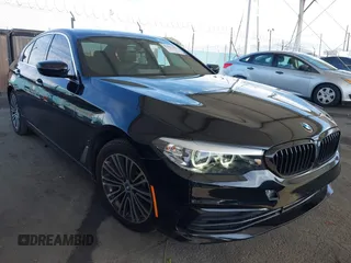 2019 BMW 5 Series 530e iPerformance with VIN WBAJA9C5XKB388498, listed as a IAAI auction lot 41461441 with 36,474 mi miles. Bid and sale history available at carsss.com. Image 1.