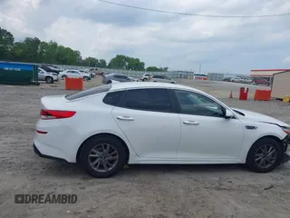 2020 Kia Optima LX with VIN 5XXGT4L3XLG385606, listed as a IAAI auction lot 42307975 with 164,000 mi miles and . Bid and sale history available at DreamBid. Image 14.