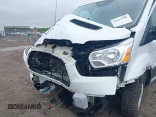 2019 Ford Transit with VIN 1FTYR1ZM3KKB50213, listed as a IAAI auction lot 42223430 with 75,131 mi miles and . Bid and sale history available at DreamBid. Image 6.