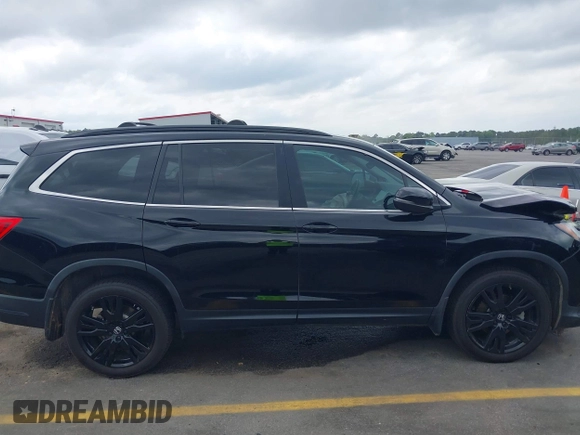 2021 Honda Pilot Special Edition z VIN 5FNYF6H22MB070469, wystawiony jako IAAI lot #41924528 z przebiegiem 56 589 mil mil oraz . Historia ofert i sprzedaży dostępna na DreamBid. Obrazek 14.