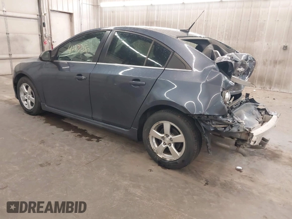 2014 Chevrolet Cruze 1LT z VIN 1G1PC5SB9E7449623, wystawiony jako IAAI lot #42277550 z przebiegiem 175 964 mil mil oraz . Historia ofert i sprzedaży dostępna na DreamBid. Obrazek 3.