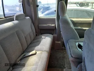 1997 GMC Sierra 2500 z VIN 1GTGK29JXVE562949, wystawiony jako Copart lot #68270174 z przebiegiem 212 422 mil mil oraz Szkody całkowita. Historia ofert i sprzedaży dostępna na DreamBid. Obrazek 10.