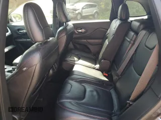 2014 Jeep Cherokee Trailhawk with VIN 1C4PJMBS4EW187085, listed as a Copart auction lot 64106985 with 166,467 mi miles and Clean title. Bid and sale history available at DreamBid. Image 11.
