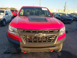 2018 Chevrolet Colorado 4WD ZR2 with VIN 1GCGTEEN7J1155034, listed as a IAAI auction lot 41157795 with 54,005 mi miles. Bid and sale history available at carsss.com. Image 12.