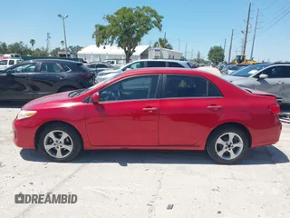 2013 Toyota Corolla L with VIN 2T1BU4EE7DC976801, listed as a IAAI auction lot 42060881 with 123,016 mi miles and . Bid and sale history available at DreamBid. Image 14.