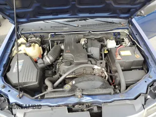 2005 GMC Canyon z VIN 1GTCS198258227947, wystawiony jako Copart lot #49483705 z przebiegiem 129 596 mil mil oraz Szkoda całkowita • Salvage title. Historia ofert i sprzedaży dostępna na DreamBid. Obrazek 11.