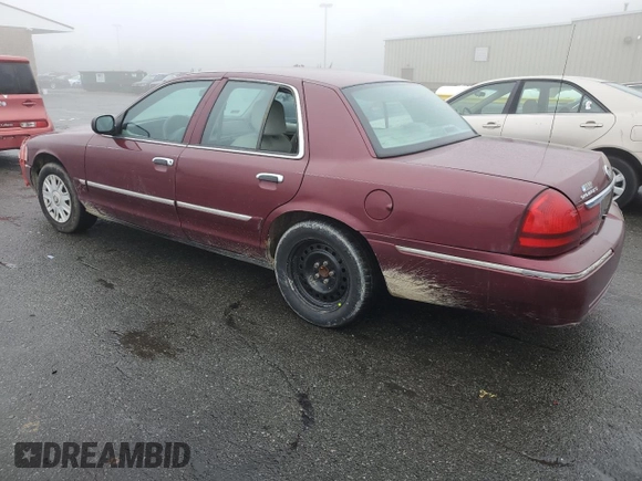 2005 Mercury Grand Marquis GS with VIN 2MEFM74W05X604628, listed as a Copart auction lot 51332335 with 165,224 mi miles and Salvage Title. Bid and sale history available at DreamBid. Image 2.