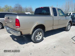 1999 Ford F-150 XL с VIN 1FTRX18L4XKB33057, выставлен на аукционе IAAI как лот 42227009 с пробегом Не указан миль и . История ставок и продаж доступна на DreamBid. Изображение 4.