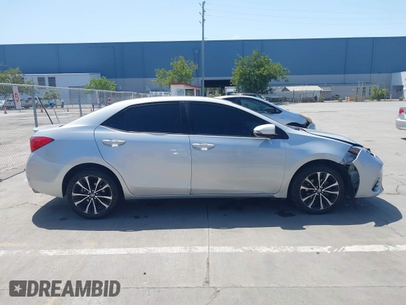 2019 Toyota Corolla L with VIN 5YFBURHE5KP877691, listed as a IAAI auction lot 42108591 with 85,813 mi miles and . Bid and sale history available at DreamBid. Image 13.