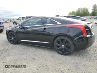 2014 Cadillac ELR z VIN 1G6RS1E46EU601838, wystawiony jako Copart lot #56005485 z przebiegiem 101 201 mil mil oraz Szkoda całkowita • Salvage title. Historia ofert i sprzedaży dostępna na DreamBid. Obrazek 2.