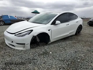 2021 Tesla Model 3 Performance with VIN 5YJ3E1ECXMF936349, listed as a Copart auction lot 49091965 with 54,296 mi miles and Salvage Title. Bid and sale history available at DreamBid. Image 1.