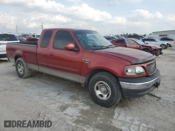 2001 Ford F-150 XL with VIN 1FTRX17W71NB71934, listed as a Copart auction lot 54231605 with 257,867 mi miles and Salvage title. Bid and sale history available at DreamBid. Image 4.