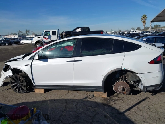 2022 Tesla Model X with VIN 7SAXCBE56NF329657, listed as a IAAI auction lot 41400629 with Not Provided miles and . Bid and sale history available at DreamBid. Image 15.