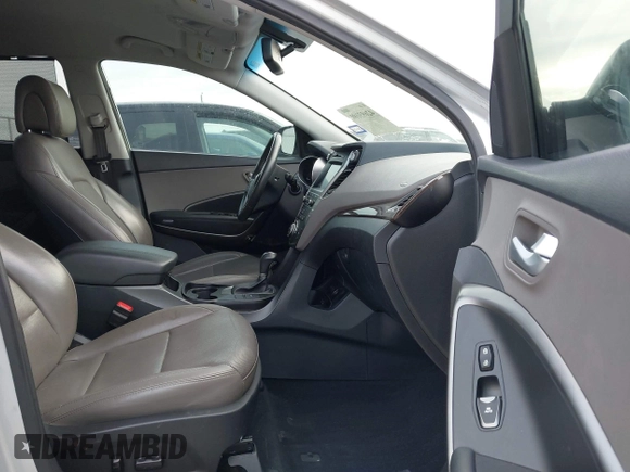 2017 Hyundai Santa Fe 2.4L with VIN 5XYZU3LB4HG464876, listed as a IAAI auction lot 42693100 with 127,888 mi miles and . Bid and sale history available at DreamBid. Image 5.