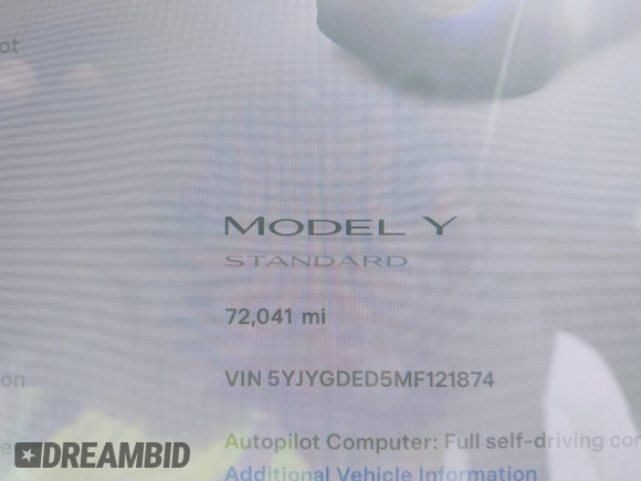 2021 Tesla Model Y Standard Range with VIN 5YJYGDED5MF121874, listed as a IAAI auction lot 41238170 with 72,041 mi miles and . Bid and sale history available at DreamBid. Image 7.