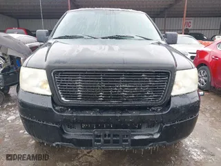 2005 Ford F-150 XL with VIN 1FTRF12W15KC00040, listed as a IAAI auction lot 41532710 with 172,371 mi miles. Bid and sale history available at carsss.com. Image 12.