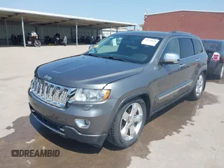 2013 Jeep Grand Cherokee Overland with VIN 1C4RJFCG2DC611877, listed as a IAAI auction lot 41910800 with 151,457 mi miles. Bid and sale history available at carsss.com. Image 18.