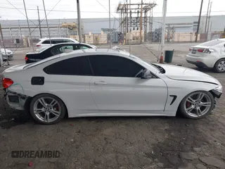 2016 BMW 4 Series 428i with VIN WBA3N7C54GK227752, listed as a IAAI auction lot 42003116 with 127,085 mi miles and . Bid and sale history available at DreamBid. Image 14.