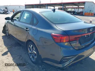 2021 Kia Forte LXS with VIN 3KPF24AD5ME309702, listed as a IAAI auction lot 41992202 with 69,531 mi miles and . Bid and sale history available at DreamBid. Image 3.