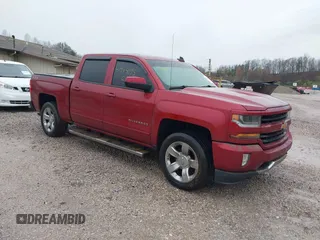 2018 Chevrolet Silverado 1500 LT with VIN 3GCUKREC2JG201754, listed as a IAAI auction lot 41944175 with 112,305 mi miles. Bid and sale history available at carsss.com. Image 1.
