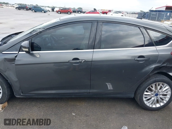 2017 Ford Focus Titanium with VIN 1FADP3N20HL210364, listed as a IAAI auction lot 42130643 with 132,312 mi miles and . Bid and sale history available at DreamBid. Image 15.