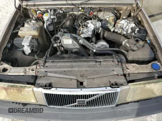 1995 Volvo 900 z VIN YV1JS8318S1193362, wystawiony jako Copart lot #79421424 z przebiegiem 38 881 mil mil oraz Tytuł czysty. Historia ofert i sprzedaży dostępna na DreamBid. Obrazek 11.