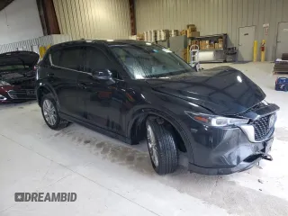 2023 Mazda CX-5 Signature with VIN JM3KFBXY6P0235017, listed as a Copart auction lot 45979615 with 14,487 mi miles and Salvage Title. Bid and sale history available at carsss.com. Image 4.