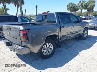 2022 Nissan Frontier SV z VIN 1N6ED1EJ4NN682356, wystawiony jako IAAI lot #41778467 z przebiegiem 26 055 mil mil oraz . Historia ofert i sprzedaży dostępna na DreamBid. Obrazek 4.