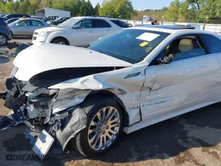 2014 Cadillac CTS Coupe Premium with VIN 1G6DD1E3XE0125273, listed as a IAAI auction lot 40534372 with 144,620 mi miles. Bid and sale history available at carsss.com. Image 6.